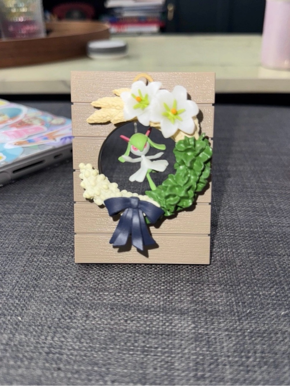 Pokemon Gardevoir Wreath Figure Accent with White Flowers and Navy Bow